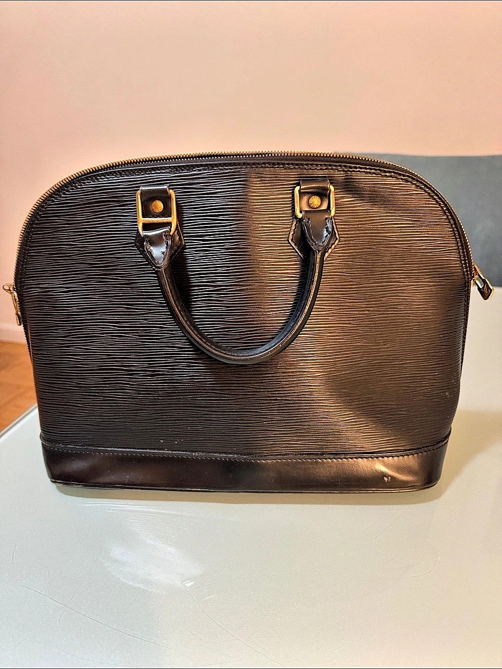 Louis Vuitton Alma PM Satchel in Brown